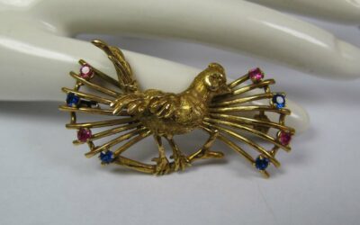 Vogel Brosche Paradiesvogel / Zweige 750 / 18K Gold – 4x Saphir & 4x Rubin